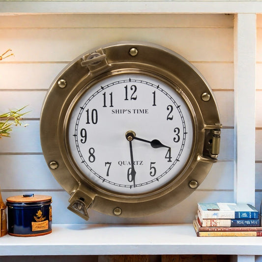 Porthole clock on wall